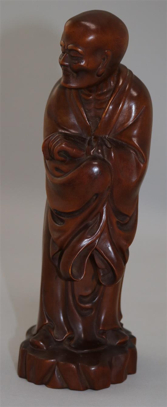 A Chinese boxwood standing figure of Luohan, 23.5cm